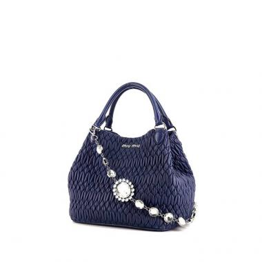 Sac bandoulière Miu Miu Iconic Crystal en cuir matelassé bleu