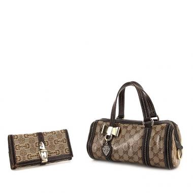 Sac à main Gucci Princy en toile monogram enduite beige et cuir marron