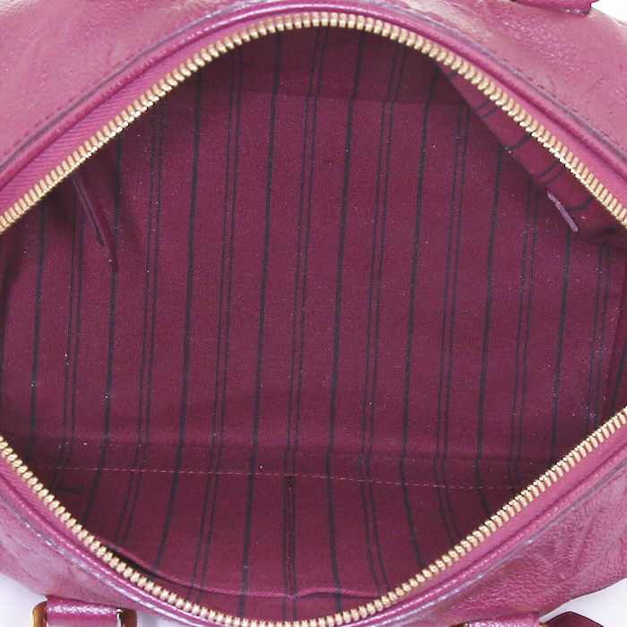 Louis Vuitton Speedy 25 cm handbag in raspberry pink empreinte monogram leather - Detail D3