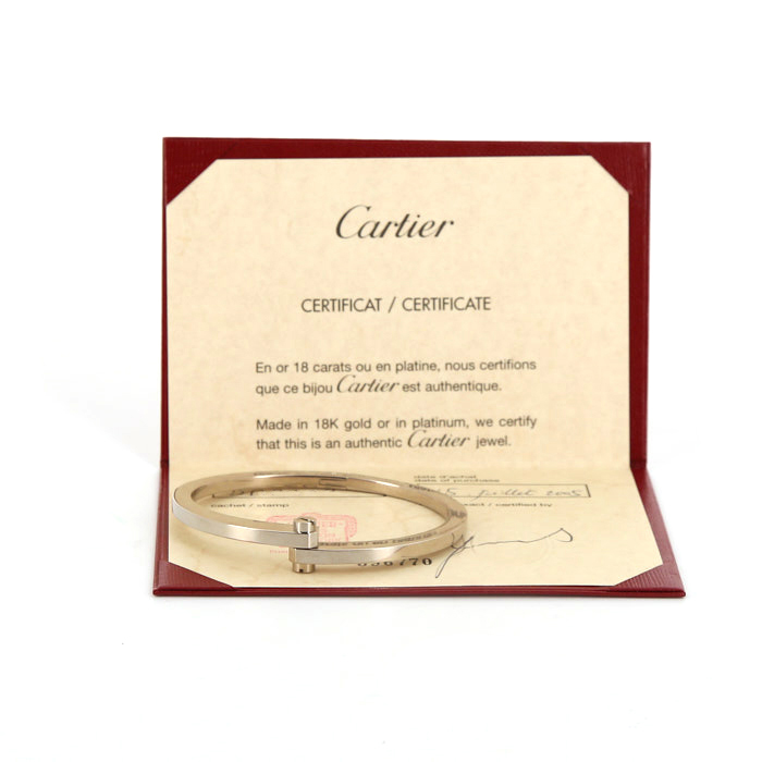 Opening Cartier Menotte bracelet in white gold