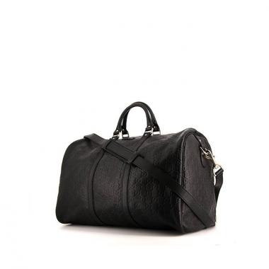 Bolsa de viaje Gucci Suprême GG en cuero Monogram negro