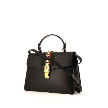 Bolso de mano Gucci Sylvie en cuero negro y lona bicolor