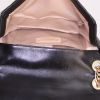 Chanel Boy shoulder bag in black and gold bicolor quilted leather - Detail D3 thumbnail