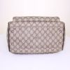 Gucci small travel bag in beige monogram canvas and brown leather - Detail D4 thumbnail