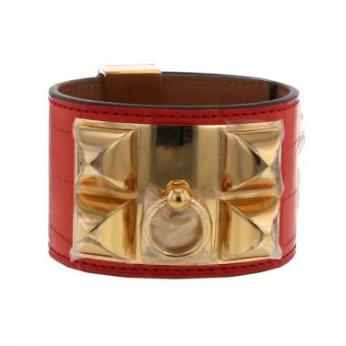 Bracelet manchette Hermes Médor en plaqué or et cuir orange