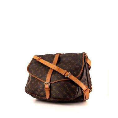 Louis Vuitton Saumur medium model shoulder bag in monogram canvas and natural leather