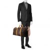Bolsa de viaje Louis Vuitton Keepall 60 cm en lona Monogram marrón y cuero natural - Detail D1 thumbnail