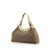 Gucci Charmy bag worn on the shoulder or carried in the hand in beige monogram canvas and cream color leather - 00pp thumbnail