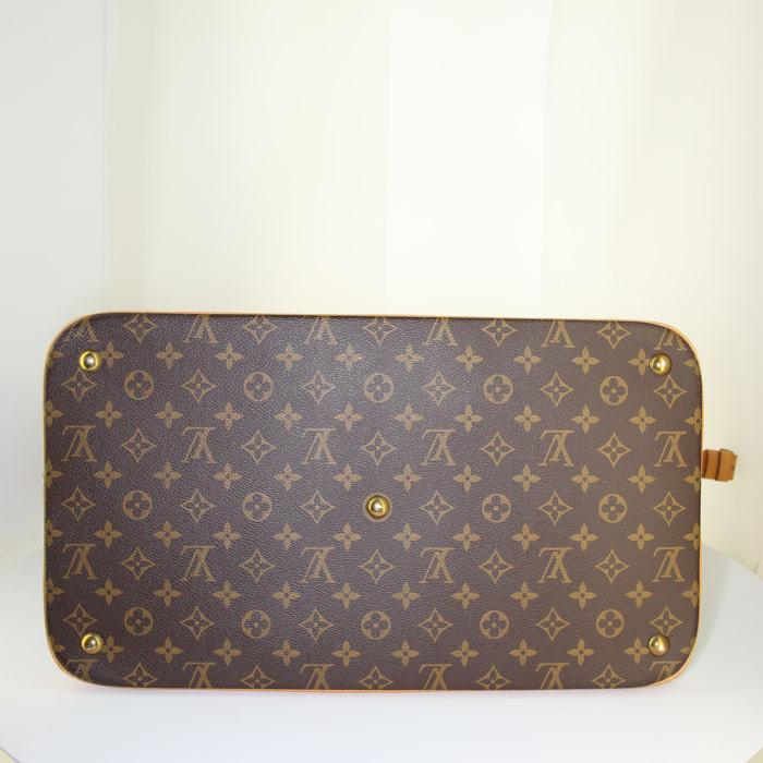 Bolsa de viaje Louis Vuitton Cruiser en lona Monogram revestida marrón y cuero natural - Detail D4