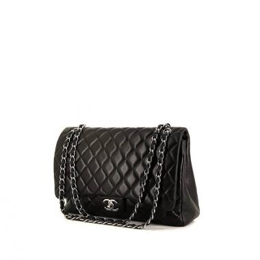 Sac à main Chanel Timeless Maxi Jumbo en cuir matelassé noir