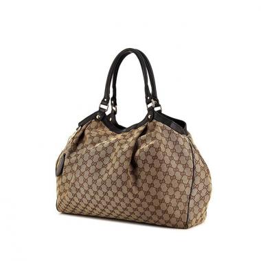 Bolso para llevar al hombro o en la mano Gucci Sukey modelo grande en lona Monogram beige y cuero marrón
