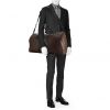 Bolsa de viaje Louis Vuitton Keepall 55 cm en lona Monogram marrón y cuero negro - Detail D2 thumbnail