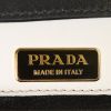 Prada Cahier shoulder bag in cream color and black leather - Detail D3 thumbnail