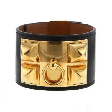 Brazalete Hermes Médor en metal dorado y cuero negro