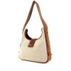 Hermès Tsako bag worn on the shoulder or carried in the hand in beige canvas and brown Barenia leather - 00pp thumbnail