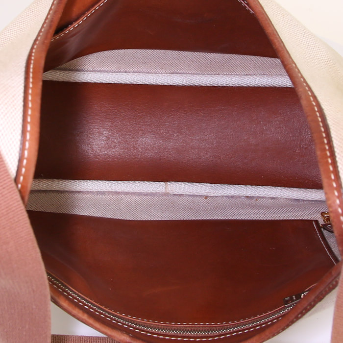 Hermès Tsako bag worn on the shoulder or carried in the hand in beige canvas and brown Barenia leather - Detail D2
