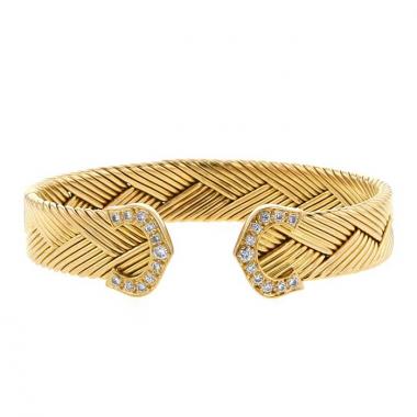 Brazalete época años 90 abierto Cartier C de Cartier en oro amarillo