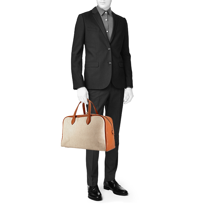 Hermes Victoria travel bag in beige canvas and gold leather - Detail D1