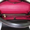 Louis Vuitton Capucines handbag in black grained leather - Detail D2 thumbnail