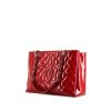 Chanel Shopping GST medium model bag worn on the shoulder or carried in the hand in red patent quilted leather - 00pp thumbnail