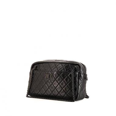 Bolso de mano Chanel Camera en cuero acolchado negro
