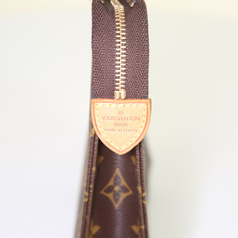 Pochette Louis Vuitton Poche Toilette en toile monogram et cuir naturel - Detail D3