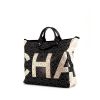 Shopping bag Chanel Deauville in tela cerata bicolore nera e bianca - 00pp thumbnail