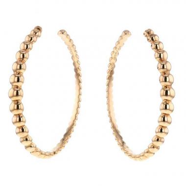 Paire de créoles Van Cleef 
Arpels Perlée en or rose