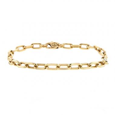 Brazalete flexible Cartier Santos en oro amarillo