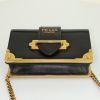 Prada Cahier handbag in black leather - Detail D4 thumbnail