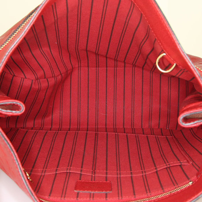 Bolso de mano Louis Vuitton Spontini en cuero monogram huella rojo - Detail D2