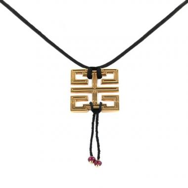 Pendentif Cartier Le Baiser du Dragon en or jaune et rubis