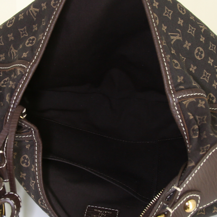 Louis Vuitton Manon medium model bag worn on the shoulder or carried in the hand in brown and beige monogram canvas Idylle - Detail D2