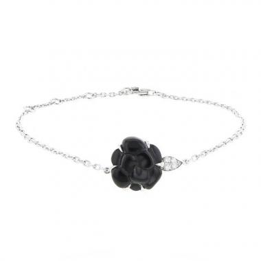 Chanel Camelia bracelet in onyx,  white gold and diamonds