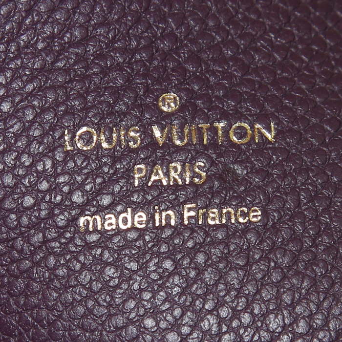 Louis Vuitton Audacieuse bag worn on the shoulder or carried in the hand in purple empreinte monogram leather and purple suede - Detail D4