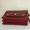 Hermès Roulis shoulder bag in Grenat red Tadelakt leather - Detail D4 thumbnail