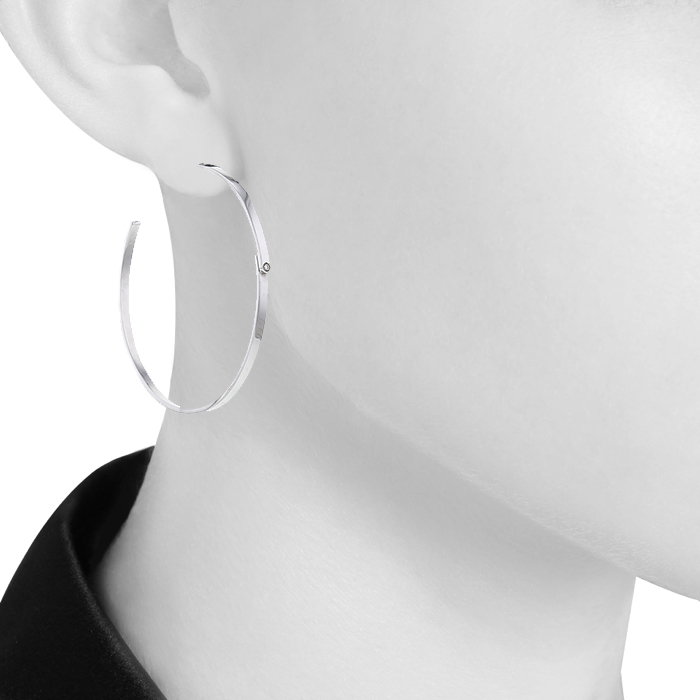 Dinh Van Double Sens hoop earrings in white gold and diamonds