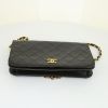Chanel Mademoiselle bag worn on the shoulder or carried in the hand in black quilted leather - Detail D4 thumbnail