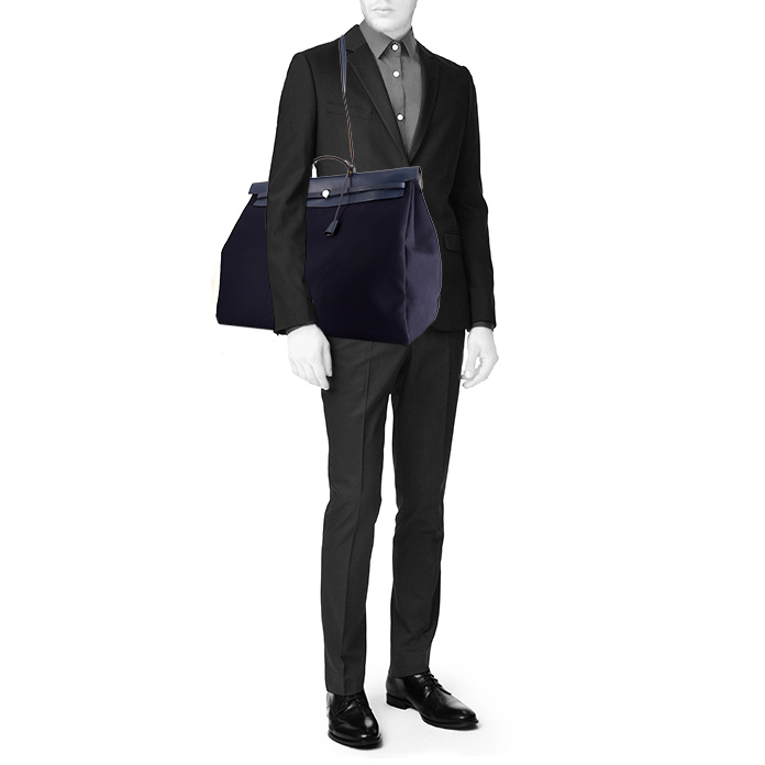 Hermes Herbag travel bag in dark blue canvas and dark blue leather - Detail D1