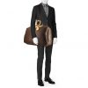 Bolsa de viaje Louis Vuitton Alize en lona Monogram revestida marrón y cuero natural - Detail D2 thumbnail