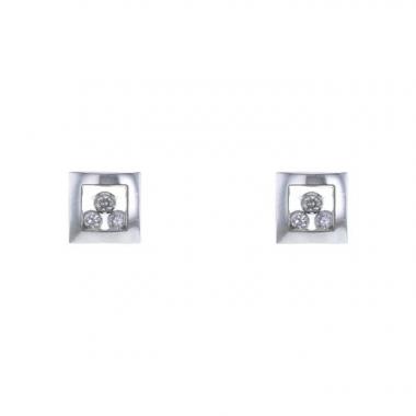 Pendientes Chopard Happy Curves en oro blanco y diamantes