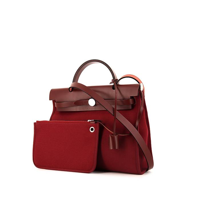 Hermes Heeboo travel bag in burgundy canvas and brown leather