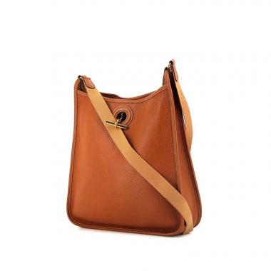 Bolso bandolera Hermes Vespa en cuero taurillon clémence color oro y lona color oro