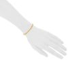Half-articulated Cartier bracelet in yellow gold and diamonds - Detail D1 thumbnail