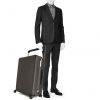 Louis Vuitton Horizon 70 suitcase in grey monogram canvas and black leather - Detail D1 thumbnail