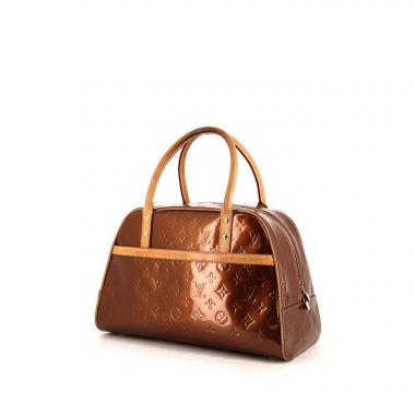 Louis Vuitton Tompkins Square bag in brown monogram patent leather and natural leather