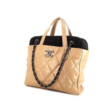 Bolso para llevar al hombro o en la mano Chanel Portobello en cuero acolchado beige y tweed negro