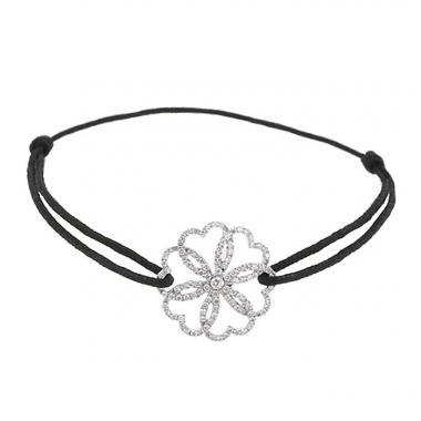 Brazalete Poiray Rosace en oro blanco y diamantes