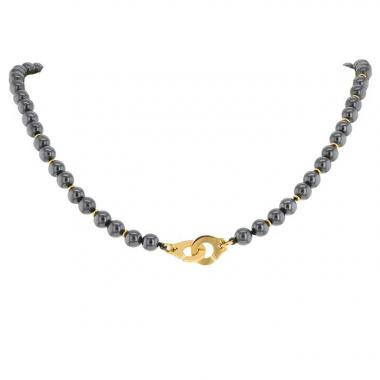 Collana Dinh Van Menottes R10 in oro giallo e hematite