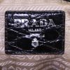 Bolso de mano Prada Jacquard en lona monogram beige y cuero negro - Detail D3 thumbnail